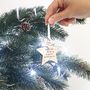 Babies First Christmas Wooden Star Christmas Decoration, thumbnail 1 of 5