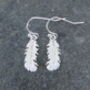 White Feather Delicate Drop Earrings, thumbnail 1 of 3