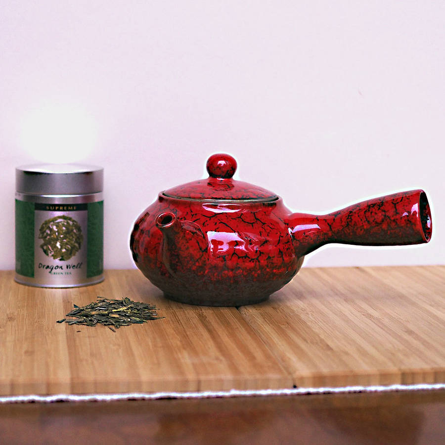 jun side handle ceramic teapot by the exotic teapot