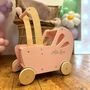 Personalised Flat Packed Pink Wooden Push Along Toy Pram, thumbnail 4 of 4