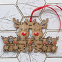 Double Sided Oak Reindeer Family Of Seven Decoration, thumbnail 1 of 9