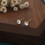 Sterling Silver Moonstone Glass Tiny Stud Earrings, thumbnail 1 of 12