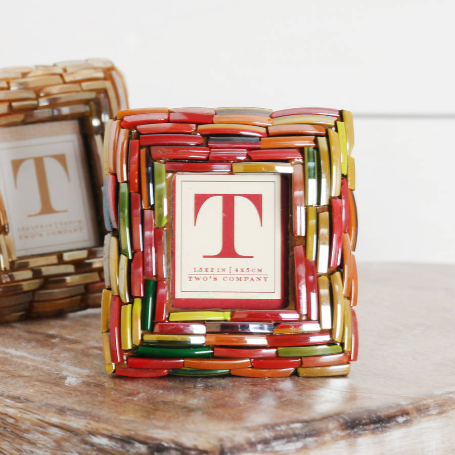 mini picture frame decoration or place setting by red berry apple