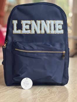 Personalised Nylon Backpack With Patch Letters And Motifs With Gold Outline, 10 of 12