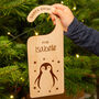 'Santa Stop Here' Personalised Penguin Door Hanger, thumbnail 4 of 6
