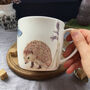 Hedgehog And Bluebell Bone China Mug, thumbnail 1 of 12