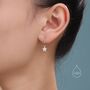 Sterling Silver Delicate Star Huggie Hoop Earrings, thumbnail 3 of 12