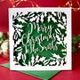 Holly Papercut Personalised Christmas Card, thumbnail 1 of 5
