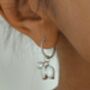 White Enamel Lily And Pearl Huggie Hoop Earrings, thumbnail 3 of 7