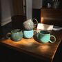 Set Of Four Reactive Glaze Mugs In Tones Of The Rainforest, thumbnail 7 of 11