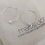 Sliding Heart Silver Hoop Earrings, thumbnail 2 of 8