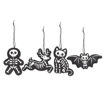 Set Of Four Black Creepy Skeleton Cookie Ornaments, 2 of 3