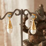 Blue Topaz And Pearl Gold Plated Stud Drop Earrings, thumbnail 1 of 8