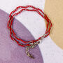 Braided Friendship Bracelet With Tiny Cross Charm, thumbnail 1 of 2