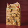 Wooden Gingerbread House LED Advent Calendar, thumbnail 1 of 9