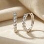 Dainty Beaded Huggie Hoop Sterling Silver Earrings, thumbnail 1 of 4