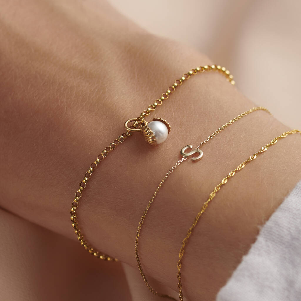 9ct Gold Pearl And Shell Charm Bracelet