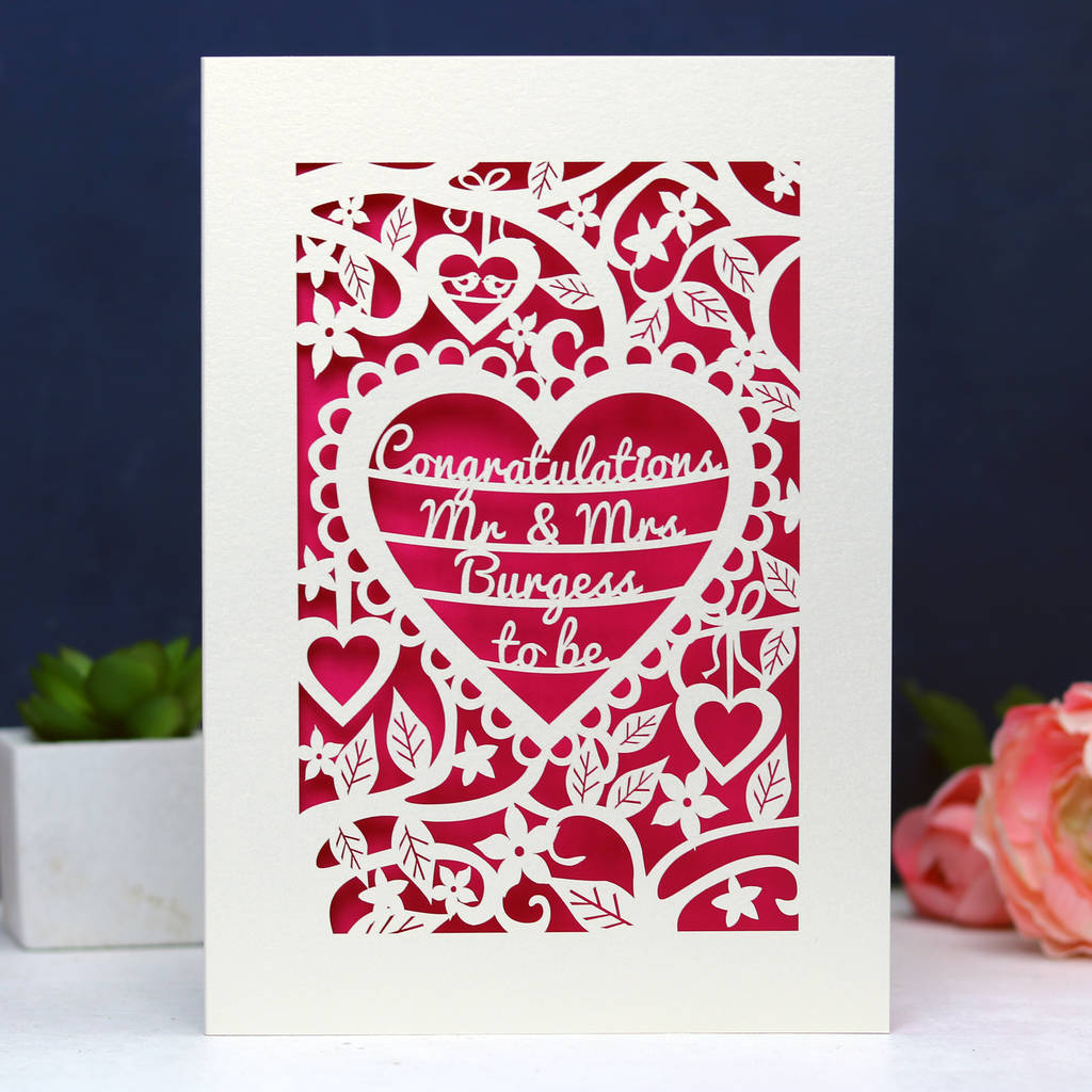 Paper cut card with love heart token
