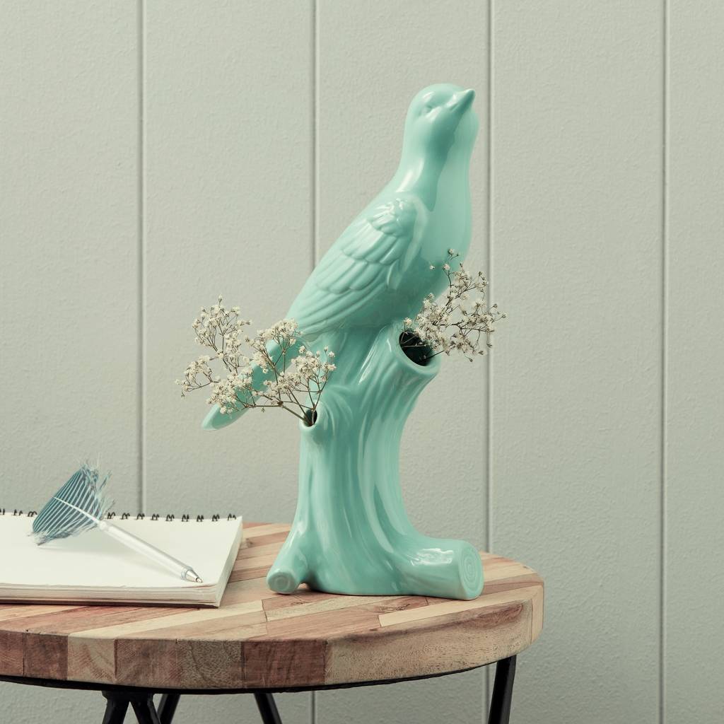 green bird vase by the contemporary home