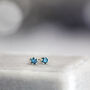 Tiny Blue Diamond Stud Earrings, thumbnail 4 of 9