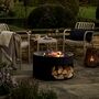 Round Steel Fire Pit With Log Store, thumbnail 1 of 5