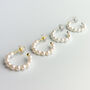 Sterling Silver Pearl Huggie Hoop Earrings, thumbnail 1 of 9