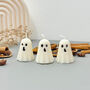 Set Of Three White Ghost Candles And Halloween Gifts, thumbnail 3 of 7