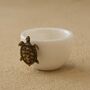 Handmade White Porcelain Snack Bowl With Bronze Turtle, thumbnail 1 of 2