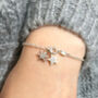 Personalised Sterling Silver Snowflake And Initial Star Necklace, thumbnail 7 of 9