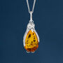 Sterling Silver Baltic Amber Penguin Necklace, thumbnail 1 of 9