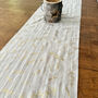 Holly Leaves Christmas Table Runner, Cream And Gold Muslin, thumbnail 3 of 8