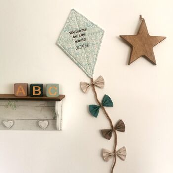 Welcome To The World, Hanging Fabric Kite, Turquoise Cotton With Baby Animal Print And Four Fabric Bows, 5 of 11