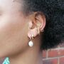 Sparkle Huggie Hoop Earrings With Baroque Pearls, thumbnail 1 of 5