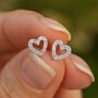 Sterling Silver Twinkling Open Heart Stud Earrings, thumbnail 2 of 4