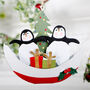 Two Happy Penguin In A Boat Christmas Tree Decoration, thumbnail 1 of 3