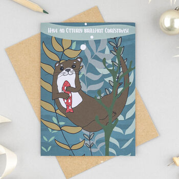 Otter With Present Christmas Card, 2 of 3