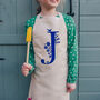 Personalised Floral Letter Kids Apron, thumbnail 2 of 5