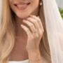 Two Ct Round Moissanite Three Stone Engagement Ring, thumbnail 3 of 9