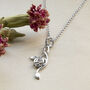 Sterling Silver Celtic Tails Necklace, thumbnail 1 of 4