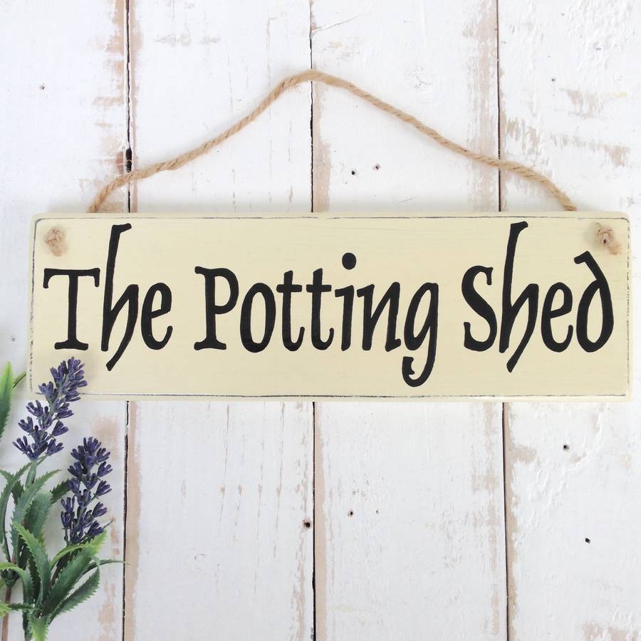 personalised wooden garden sign by potting shed designs 