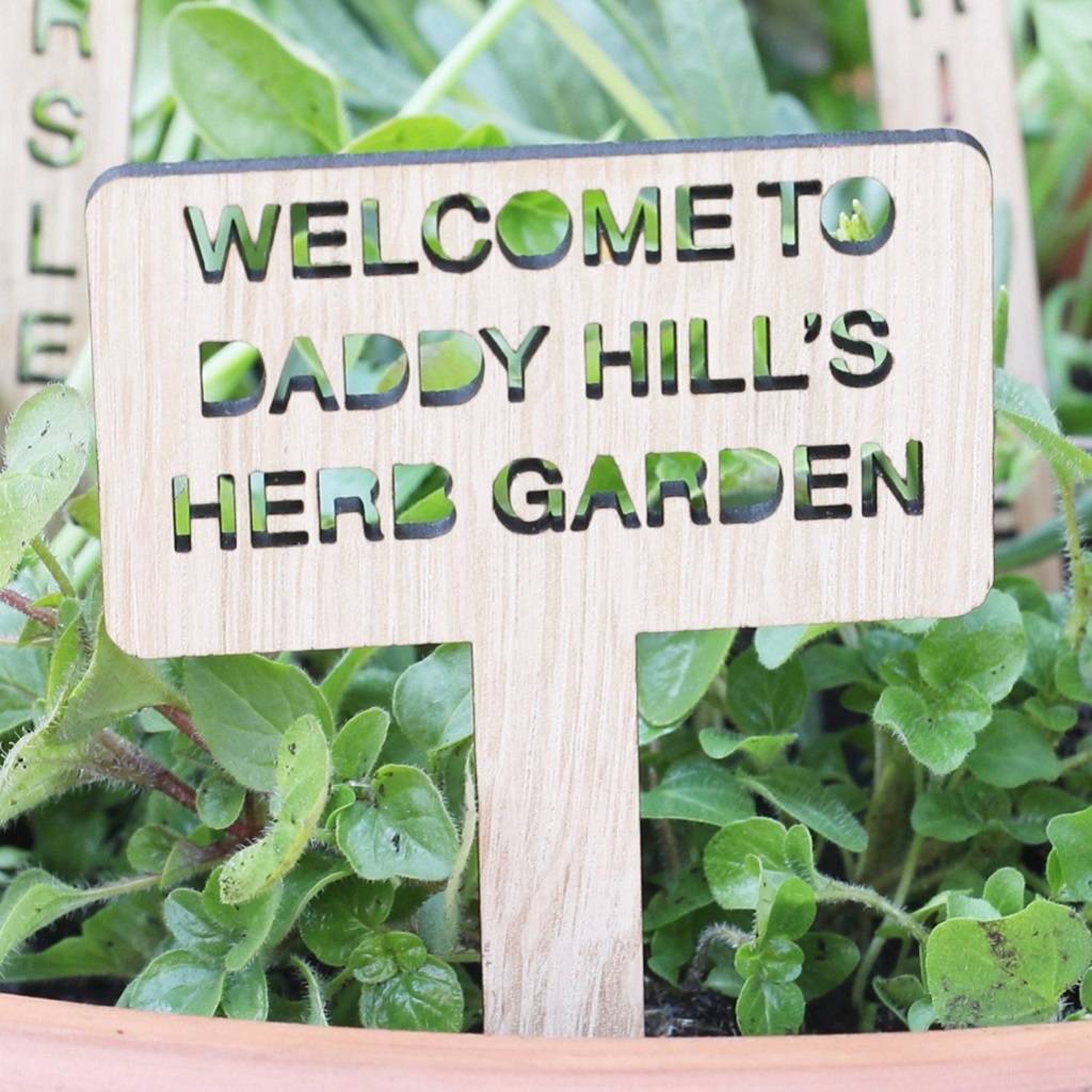 Set Of Seven Personalised Wooden Herb Garden Markers, 1 of 4