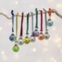 Nine Mini Shiny Baubles With Velvet Loops, thumbnail 1 of 3