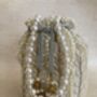 Handcrafted Ivory Pearl Potli With Pearl Wrist Chain, thumbnail 2 of 9