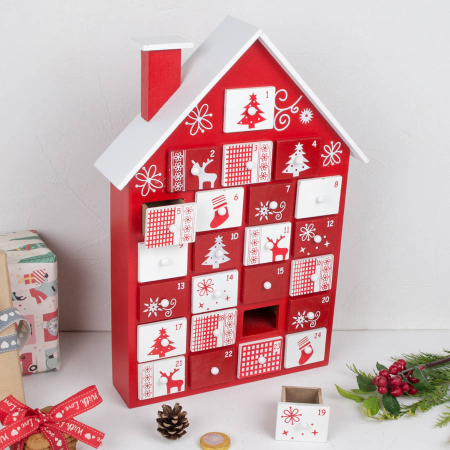 wooden cottage advent calendar by dibor | notonthehighstreet.com