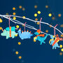 Set Of Four Children's Dinosaur Christmas Decorations, thumbnail 1 of 4