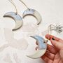 Handmade Ceramic Moon Ornament: Blue And White Glaze, Festive Tree Decoration, thumbnail 2 of 4