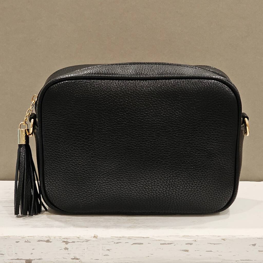 Single Zip Cross Body Bag With Tassel In Black By Nest