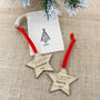 First Christmas As Grandparents Personalised Wooden Star Christmas Decorations, thumbnail 3 of 5