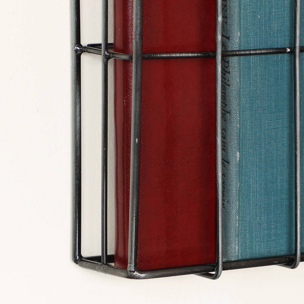 contemporary metal wall mounted magazine rack by dibor