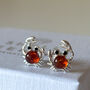 Sterling Silver And Cognac Amber Crab Stud Earrings, thumbnail 1 of 8